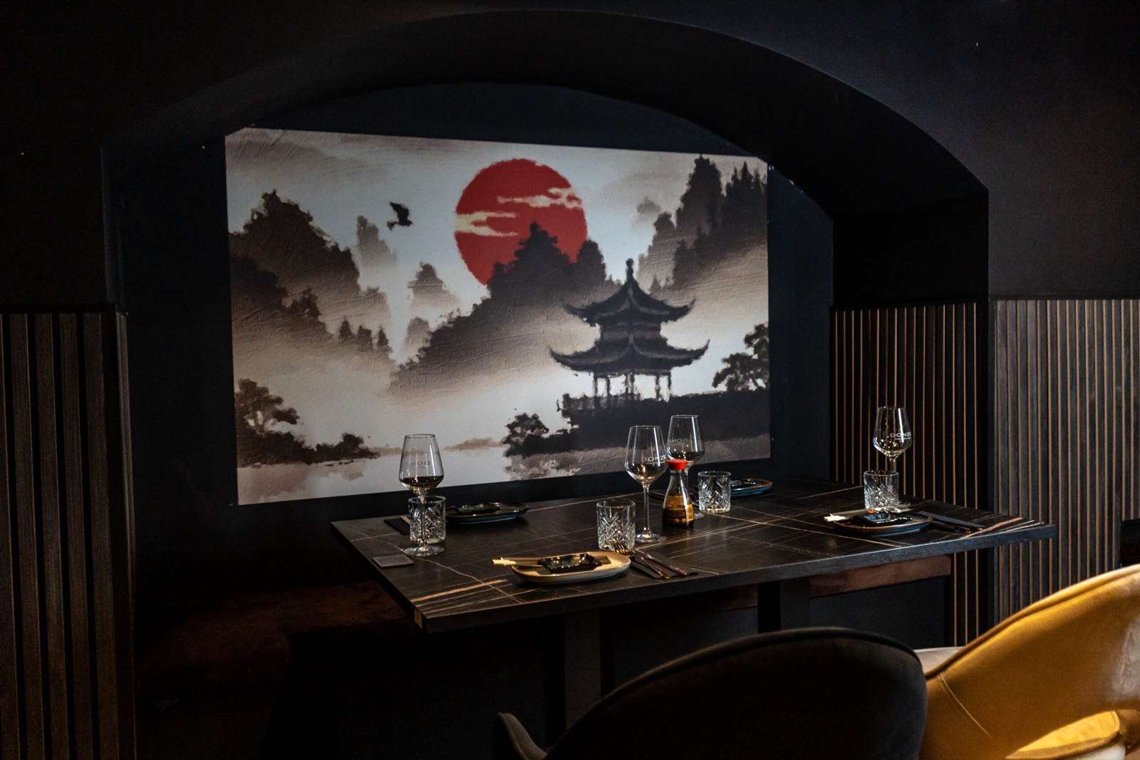 Intimate booth with Japanese pagoda mural at Donzo Sushi & Cocktailbar Rotterdam