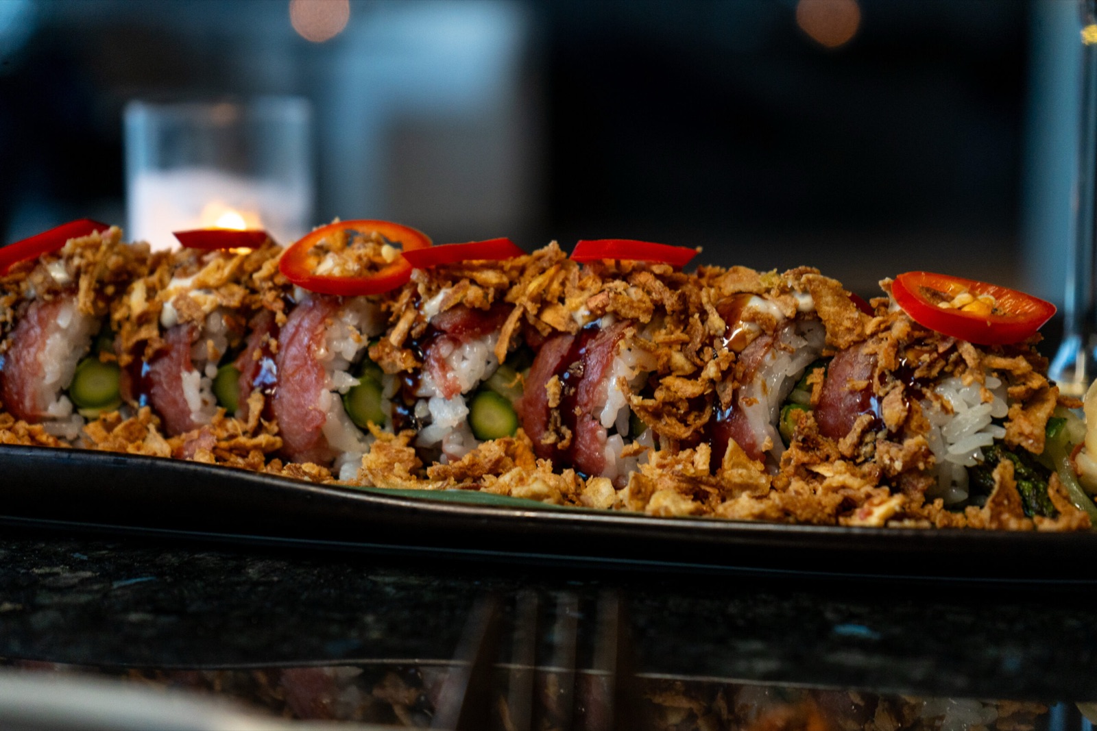 Macro detail of crispy sushi with chili at Donzo